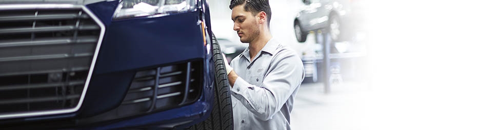man changing tire